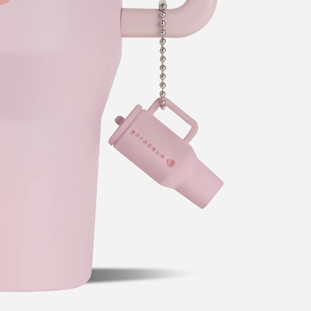 traveler-keychain-i9 Web-TravelerKeychainPhotos-PinkSand2.webp